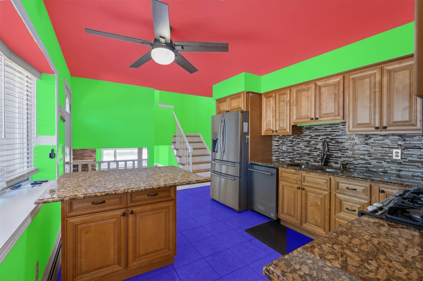 The same mask composited over the source photograph — Galley kitchen. Wall cabinetry, a tiled splashback and a ceiling fan break up every surface at once, with an open stair run carrying the wall class into the background.