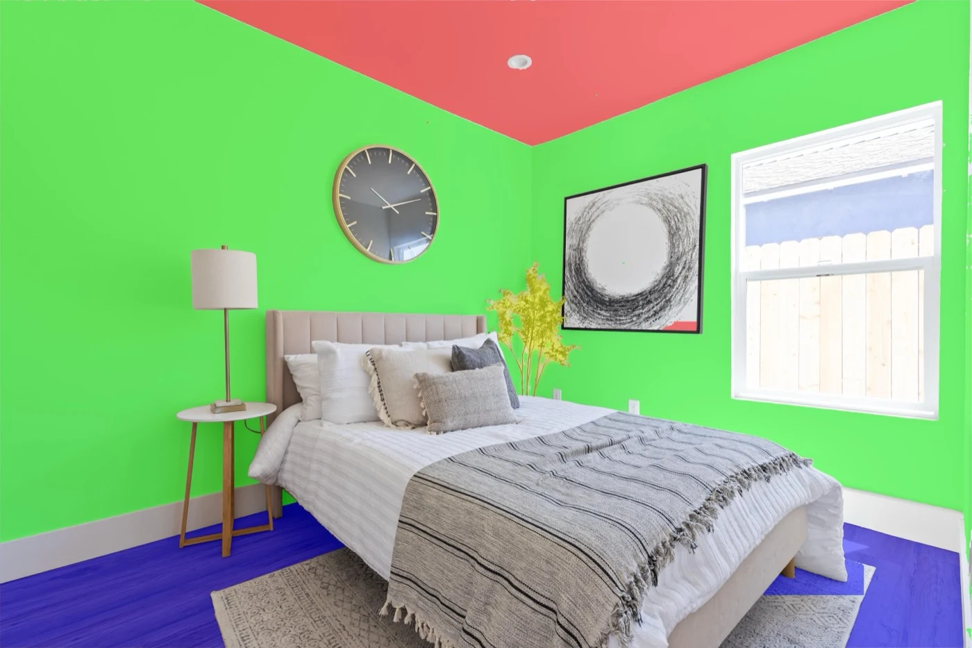The same mask composited over the source photograph — Furnished bedroom. The bed, lamp, clock and framed art fall outside the class set and are left black rather than absorbed into the wall behind them. The stems beside the headboard resolve as plant.